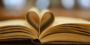 Book pages folded to form a heart